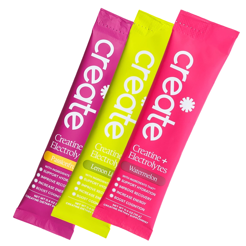 Three creatine and electrolytes sticks in lime, yellow and pink